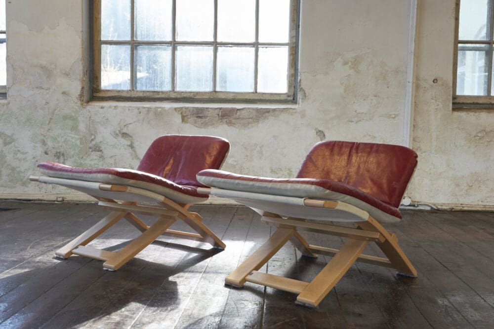 A pair of Swedish Kroken Leather Lounge Chairs and Stools - Image 9