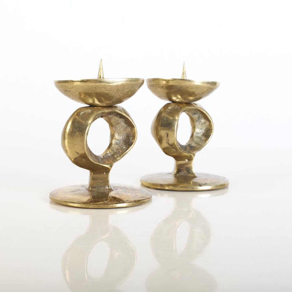 Pair of Brutalist brass candlesticks