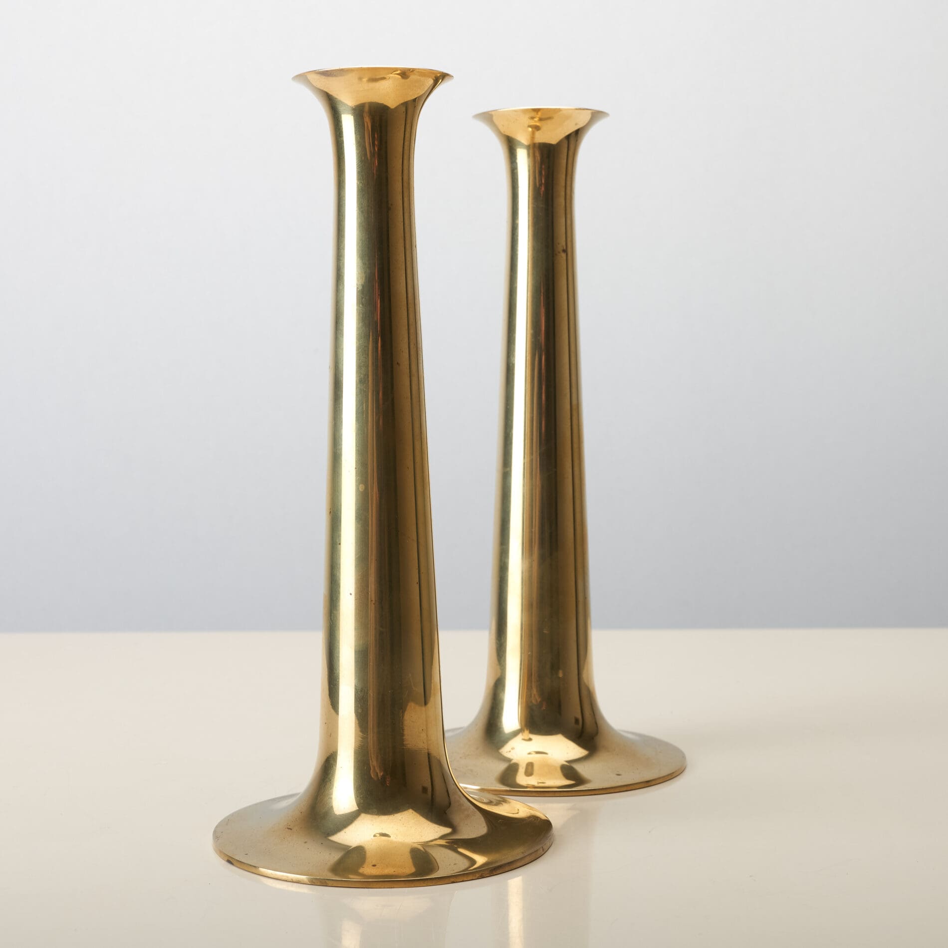 A pair of brass Torben Ørskov & Co candlesticks, Denmark