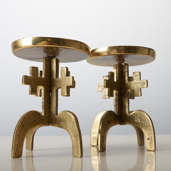 A pair of Italian Brutalist bronze candlesticks